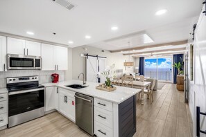 Fridge, microwave, oven, stovetop - Beautifully renovated 3-2 unit at Splash with beach service during season. (Panama City Beach)