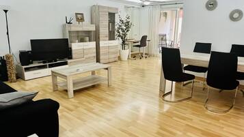 Apartment | Living area | TV, fireplace