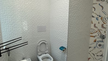 Hair dryer, towels, soap, toilet paper