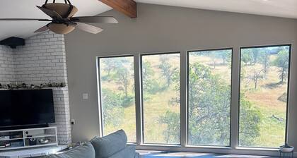 Charming 2-bedroom house with 3 car garage and plenty of additional parking.