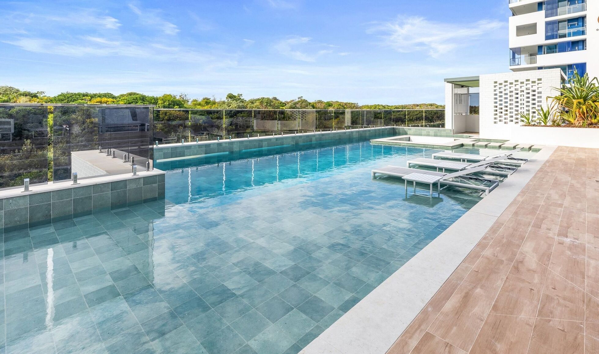 Outdoor pool, pool umbrellas, sun loungers