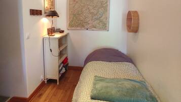 1 bedroom, desk, iron/ironing board, travel crib