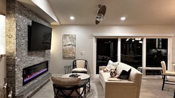 Smart TV, fireplace, books