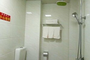 A shower area with a towel rack and a soap dispenser. - Xiangtan Xiangyang Hotel (Xiangtan County)