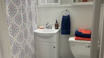 Hair dryer, towels, soap, toilet paper