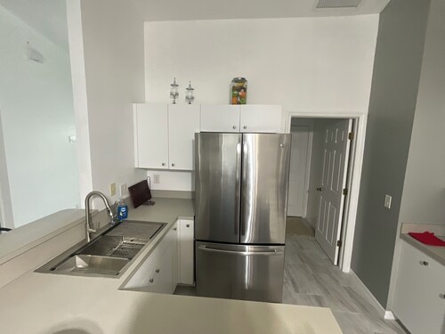 Spacious 4-bedroom house in peaceful Lehigh Acres with WiFi, AC. Newly remodeled