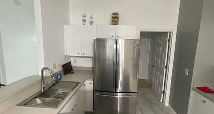 Spacious 4-bedroom house in peaceful Lehigh Acres with WiFi, AC. Newly remodeled