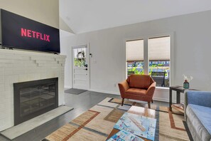 TV, fireplace, books, offices