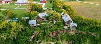 Private Riverfront Estate with Pool, Hot Tub & River Access – Sleeps 24
