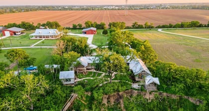 Private Riverfront Estate with Pool, Hot Tub & River Access – Sleeps 24