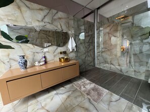 Shower, hair dryer, towels, soap