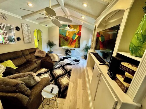Charming 3-bedroom private oasis with pool. Awesome game room for all ages.