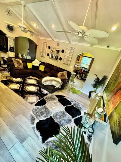 Charming 3-bedroom  private oasis with pool. Awesome game room for all ages.