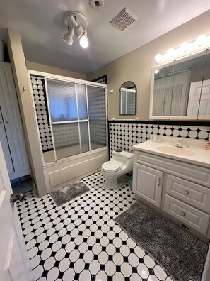 Hair dryer, towels, soap, shampoo