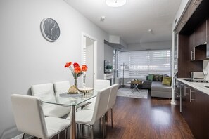 Enjoy a stylish space with a dining area, living space, and fully equipped kitchen.