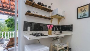 Fridge, microwave, stovetop, coffee/tea maker