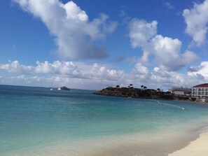 On the beach, sun-loungers, beach towels
