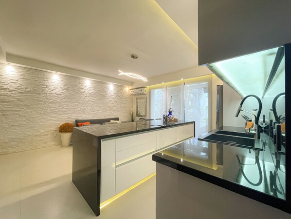 Comfort Apartment | Living area | Flat-screen TV - Best of Marbella (Puerto Vallarta)