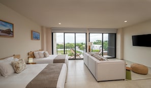 Suite estudio Deluxe, 2 camas matrimoniales, cocina, vista a la ciudad | 1 habitación, ropa de cama de alta calidad, edredón y cortinas blackout