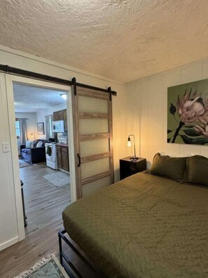 1 bedroom, desk, iron/ironing board, travel cot