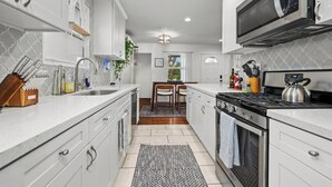Coffee/tea maker, fridge, microwave, oven - Group Getaway near Beach—Pool, Hot Tub, Sauna, Gym (Oceanside)
