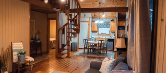 Cozy 2-bedroom cottage with loft, AC, and WiFi on peaceful 295-acre property