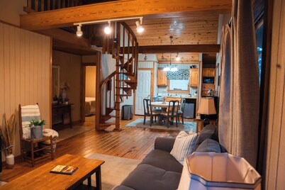 Cozy 2-bedroom cottage with loft, AC, and WiFi on peaceful 295-acre property