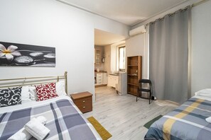 Iron/ironing board, bed sheets - GuestHost - La Cartolina - Cozy APT near the Central Station (Trieste)