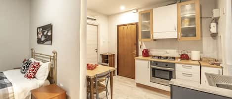 Fer et planche à repasser, draps fournis