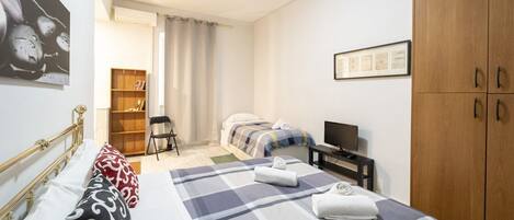 Fer et planche à repasser, draps fournis