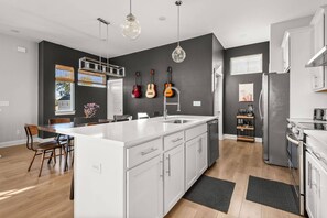 Fridge, microwave, dishwasher, coffee/tea maker