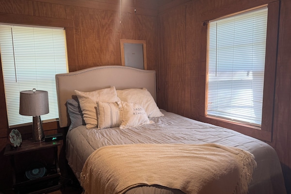 Bedroom features one queen bed