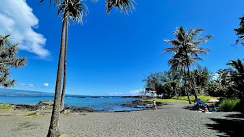 On the beach, sun loungers, beach towels