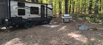 A well-maintained, cozy camper  in a secluded location near state land