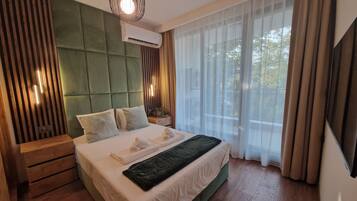 1 dormitorio, tabla de planchar con plancha, wifi gratis y ropa de cama