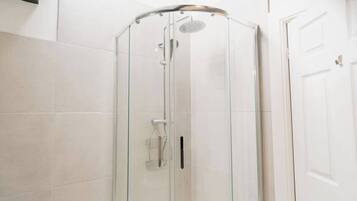 Shower, hair dryer, shampoo