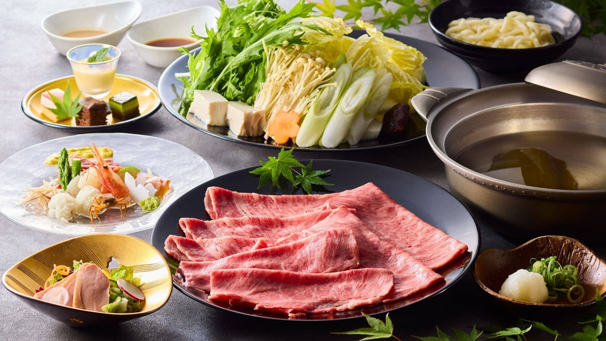 A variety of dishes including sashimi, vegetables, and a bowl of soup.