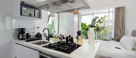 Microwave, stovetop, coffee/tea maker, toaster