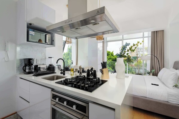 Microwave, stovetop, coffee/tea maker, toaster