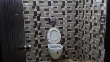 Shower, rainfall showerhead, towels, soap