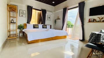 Deluxe Double Room, Balcony | Desk, laptop workspace, iron/ironing board
