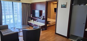 Deluxe Apartment | Living area | 40-inch LED TV with satellite channels - MoonLight Residence (Kota Kinabalu)