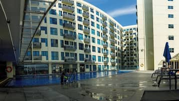 Outdoor pool, open 8:00 AM to 5:00 PM, pool umbrellas