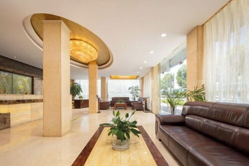 Harmonious Business Travel Hotel (jingxian Hongxing Square Branch)