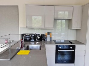 Appartement | Cuisine privée | Réfrigérateur, micro-ondes, four, plaque de cuisson