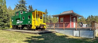 Railway Getaway Charming Caboose by Nature