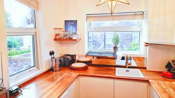 Fridge, dishwasher, toaster, cookware/dishes/utensils