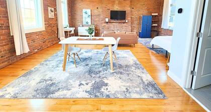 Jennifer's Historic Brick Riverfront Loft Apartment