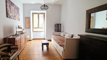 Apartamento urbano, ar-condicionado, vista para a cidade | Área de estar