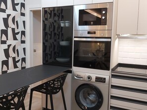 Fridge, microwave, coffee/tea maker, toaster
